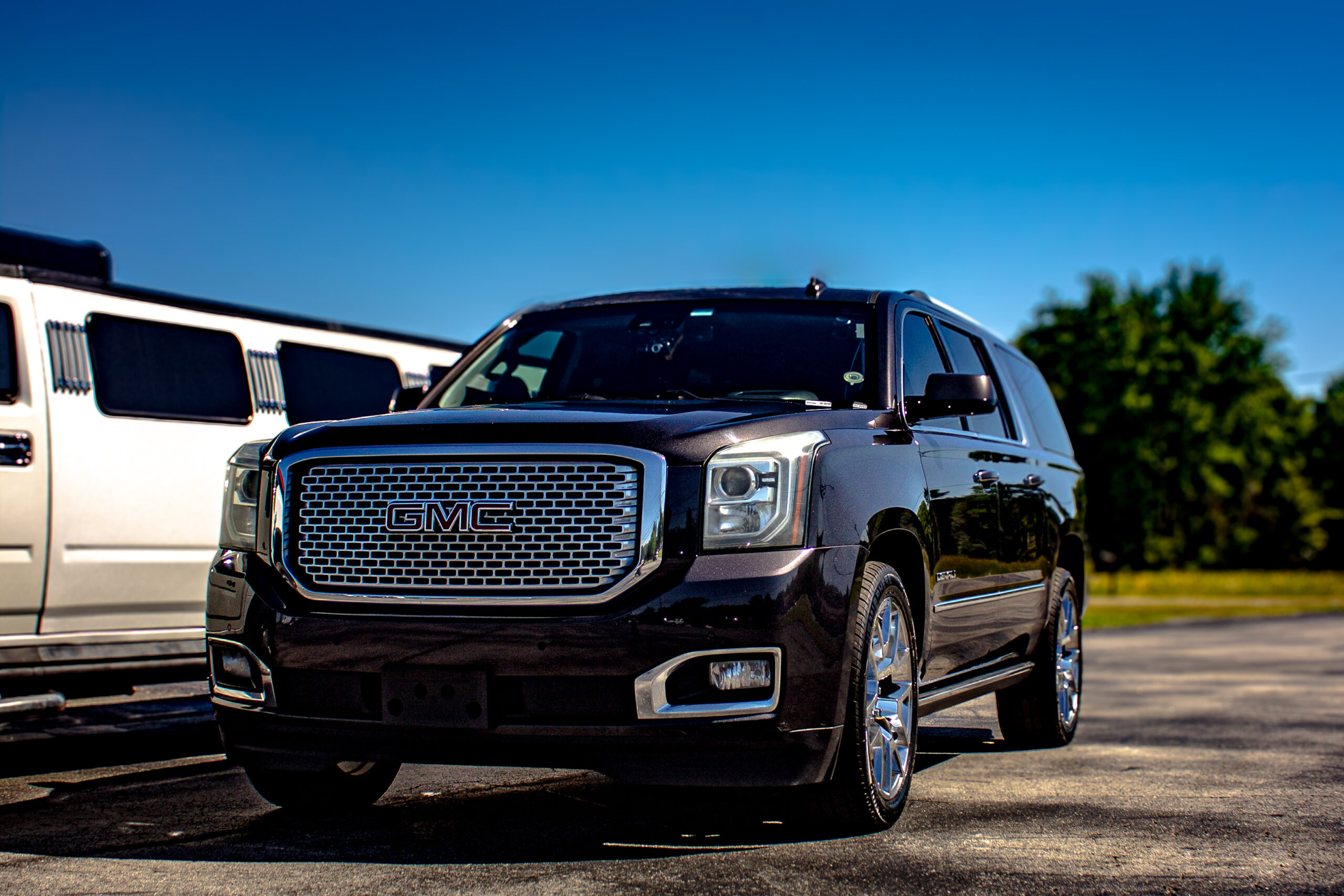 Meet in the Middle Executive travel GMC Denali